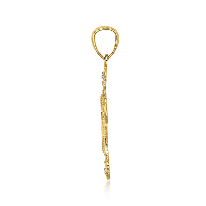 Two-tone gold cross pendant side profile with diamond-cut detailing and bail loop