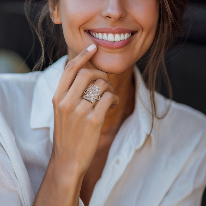 Sterling silver rectangle pavé zircon ring on a woman's finger