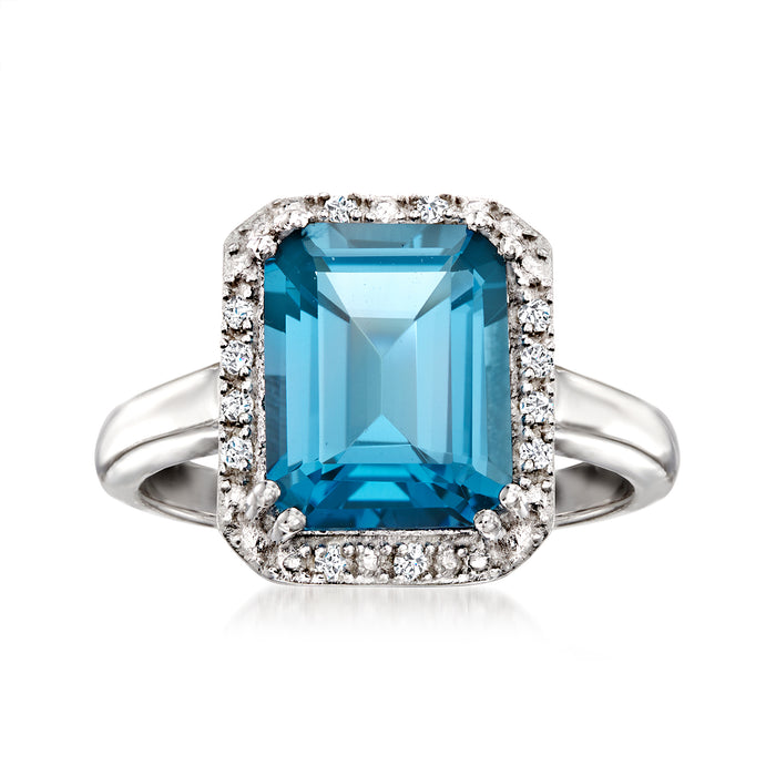 Sterling silver ring with large blue topaz center and diamond halo, cushion cut