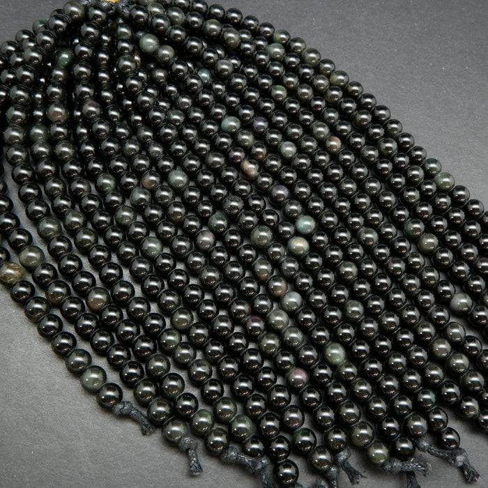 Black rainbow obsidian large hole beads.