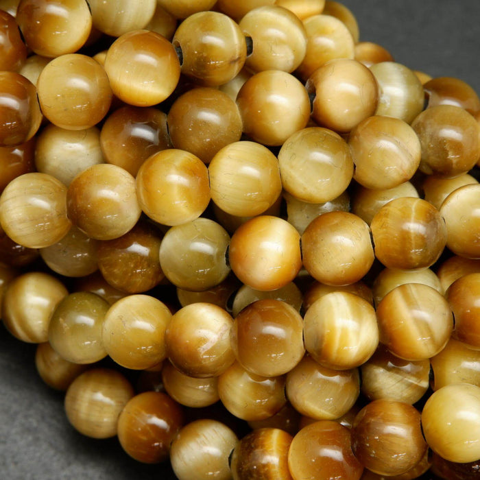 Large hole yellow blonde tiger's eye beads.