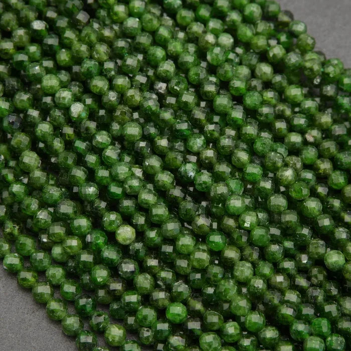 Close-up of green beads on a gray background