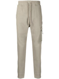 C.P. COMPANY Logo patch tapered track pants Brown - MAISONDEFASHION.COM