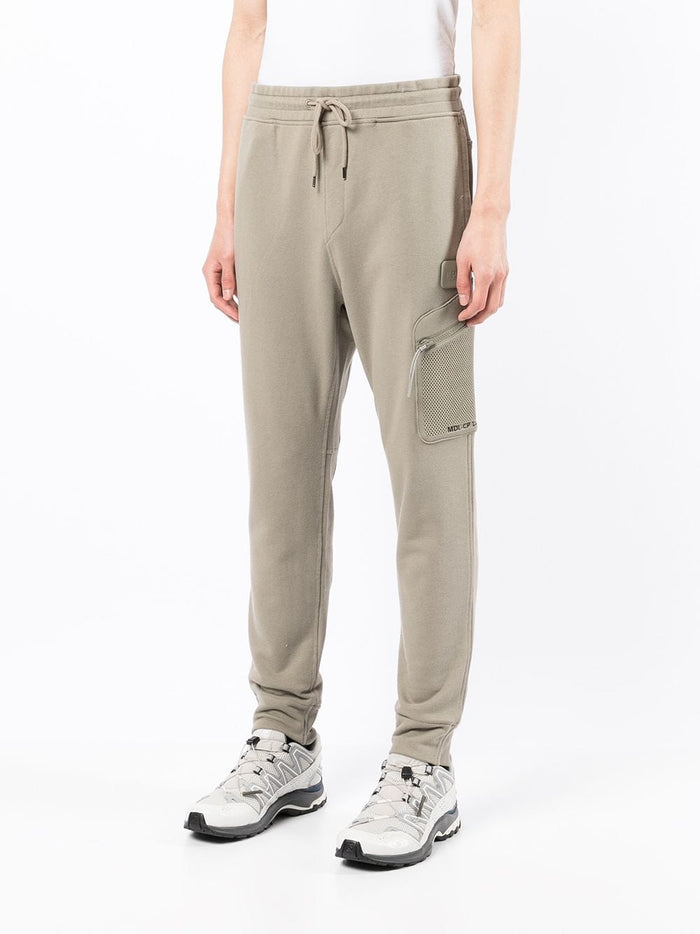 C.P. COMPANY Logo patch tapered track pants Brown - MAISONDEFASHION.COM