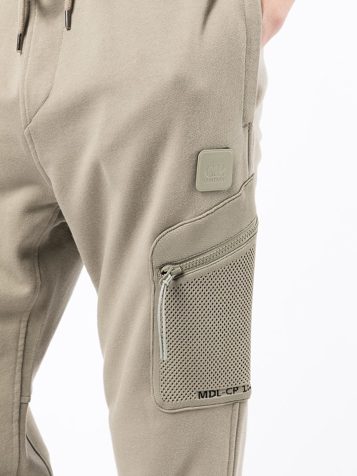 C.P. COMPANY Logo patch tapered track pants Brown - MAISONDEFASHION.COM