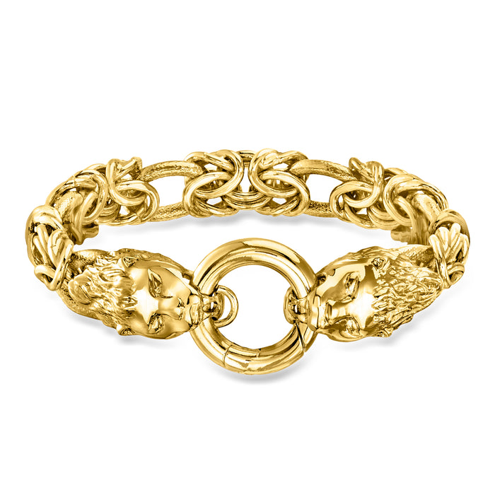 Yellow gold-plated link bracelet with two lion head charms and oval ring clasp