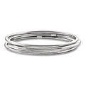 Three polished sterling silver bangle bracelets, stacked round hoops with smooth shine