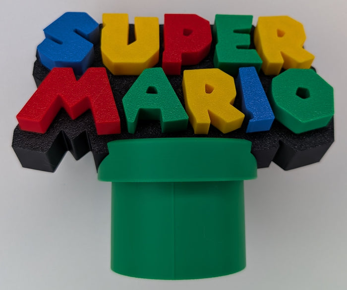 Nintendo Super Mario Logo & Warp Pipe - Desk Paper Weight/Novelty Pop Art - Multicolour 13 x 11 x 7 cm