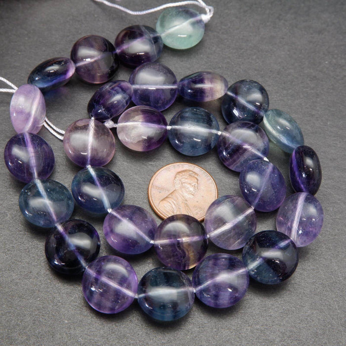 Multicolor fluorite coin shape beads.