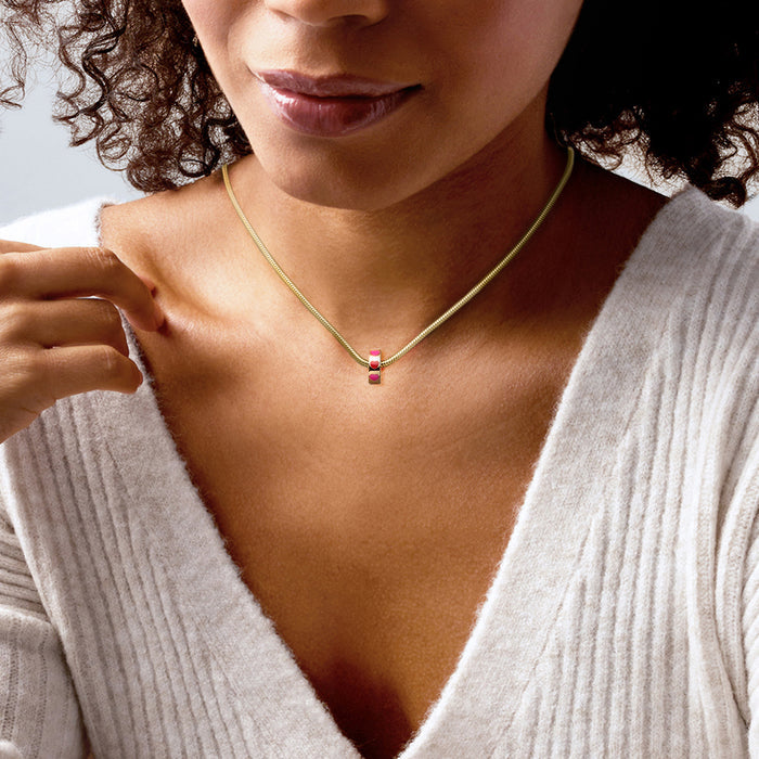 Heart enamel bead charm on a thin gold chain necklace