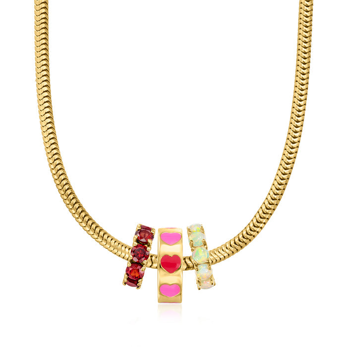 Gold chain necklace with heart bead charm featuring red and pink enamel hearts
