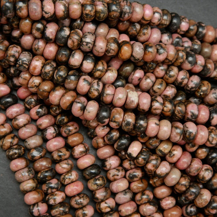 Pink rhodonite with matrix rondelle beads. Loose beads for jewelry making.