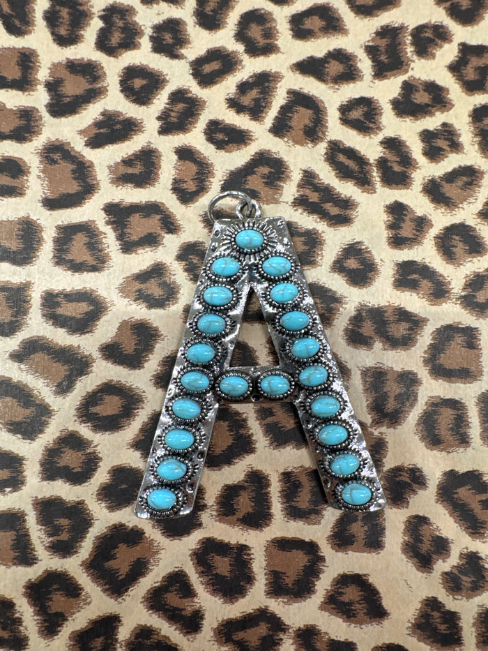 SILVER TURQ INITIL CHARMS