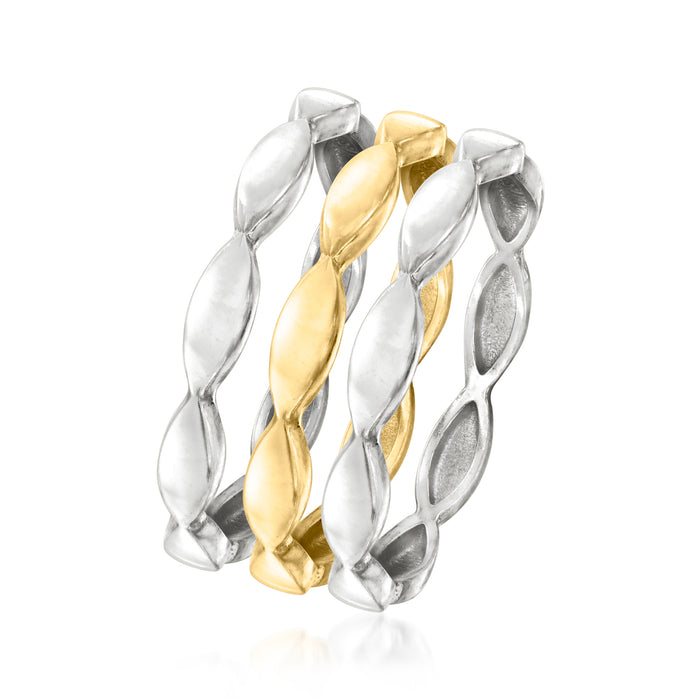 Stacked wave rings with alternating silver and gold-tone ovals, open band design