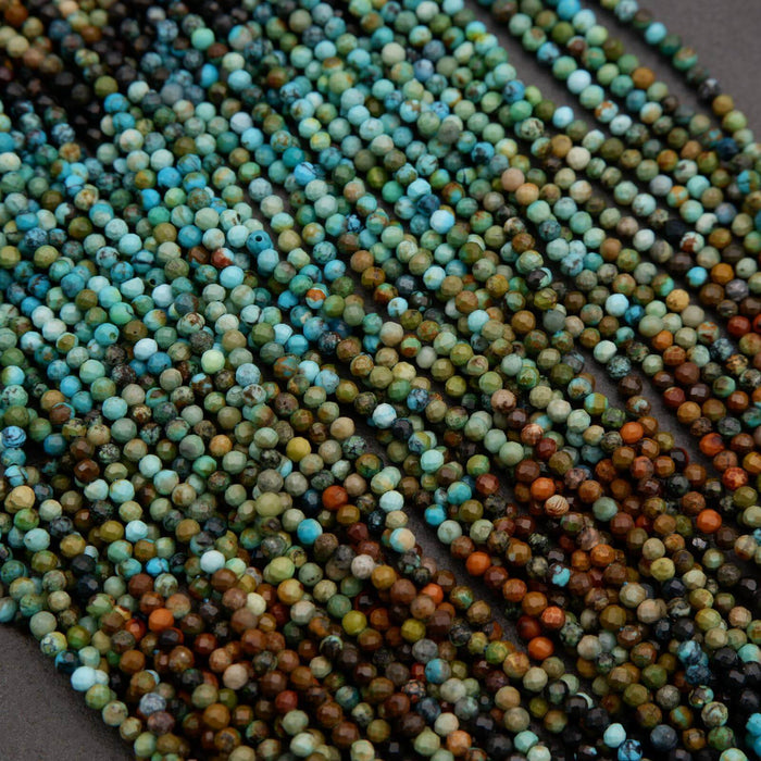 Close-up of multicolored bead strings on a dark background