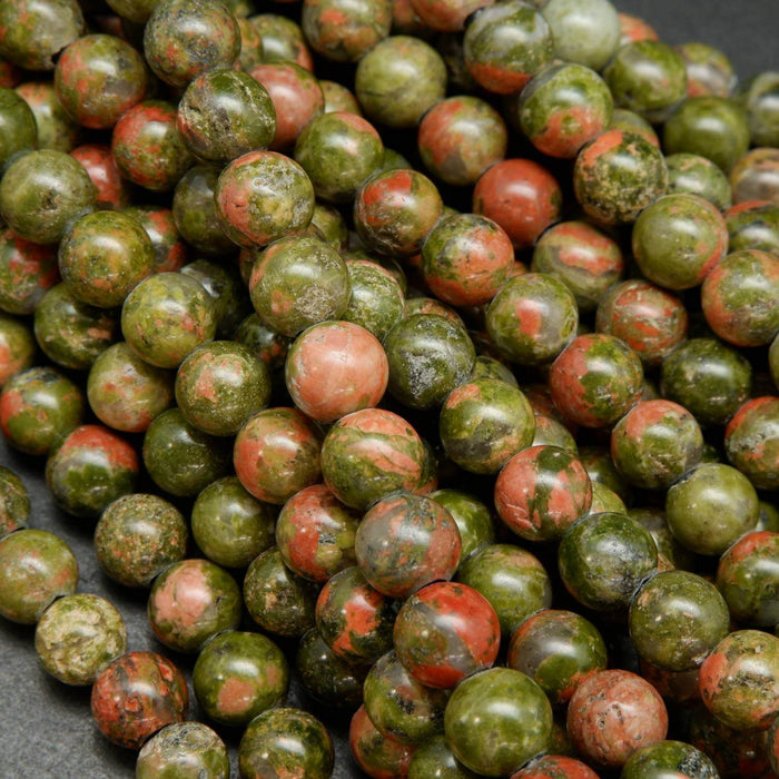 Drab green and pinkish orange unakite large hole beads.