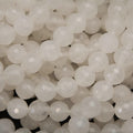 Faceted white jade beads.