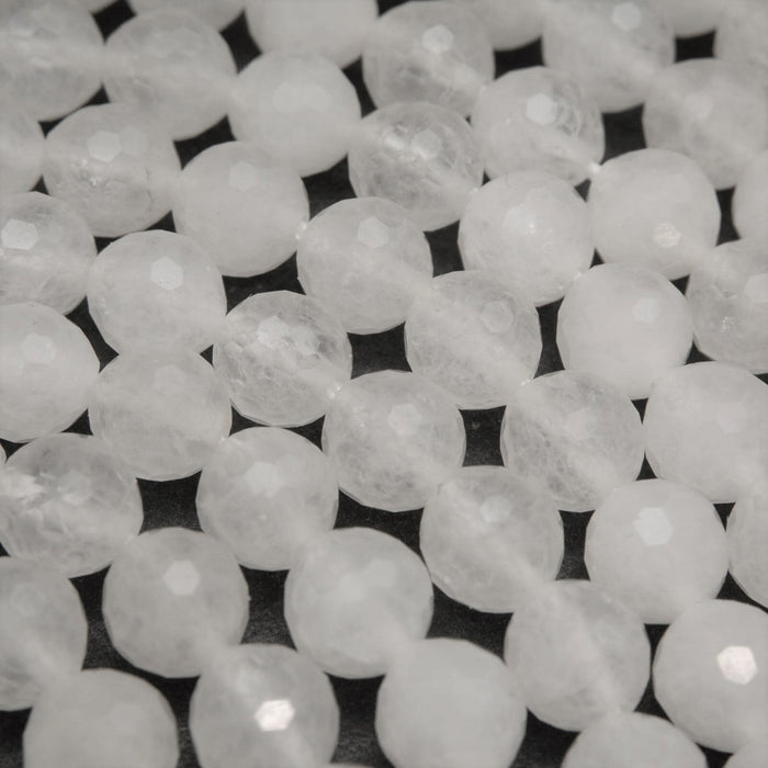 Faceted white jade beads.