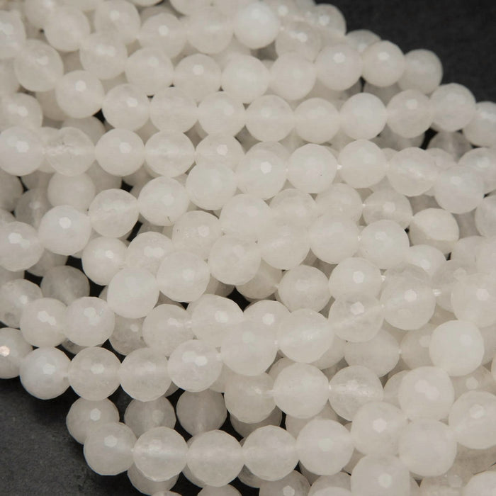 Faceted white jade beads.